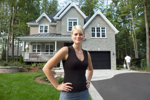 Woman with a house